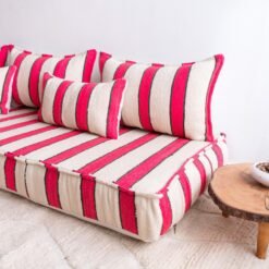 Moroccan artisan wool sofa with cream base and red/black stripes – handmade for low boho floor living
