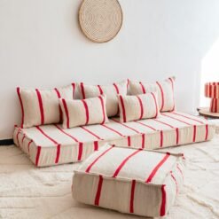 Left view of cream Moroccan wool sofa with thin red lines – minimalist low couch with boho handmade touch