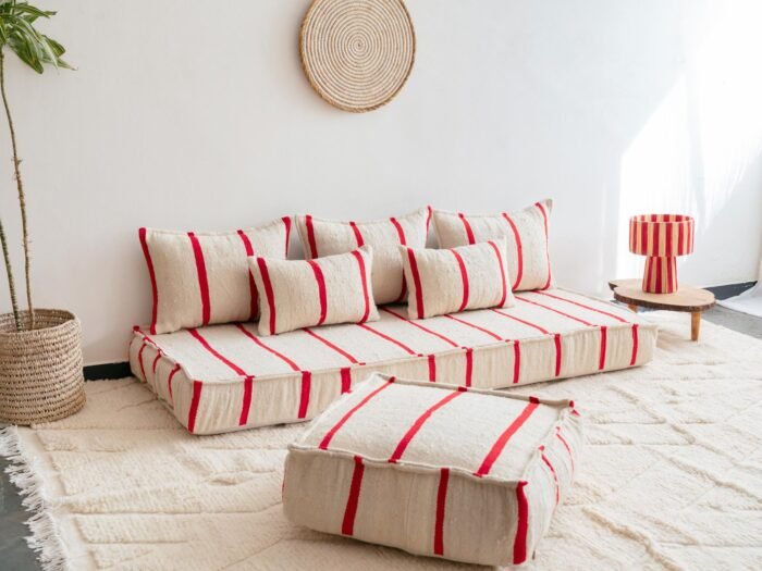 Left view of cream Moroccan wool sofa with thin red lines – minimalist low couch with boho handmade touch