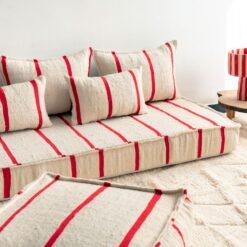 Top view of Moroccan wool sofa in cream with delicate red lines – handcrafted floor seating set for cozy homes