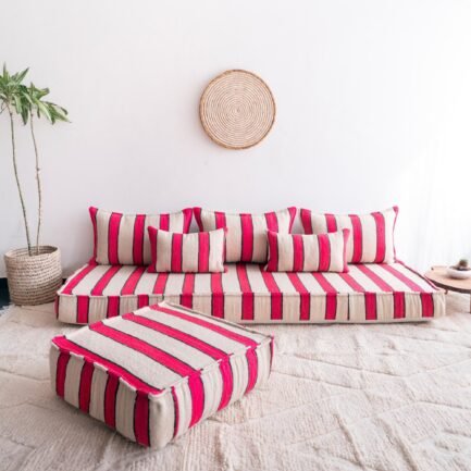 handmade Moroccan wool sofa in cream with bold red and black stripes – low floor seating set for boho and modern homes