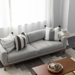 Moroccan handwoven pillow in cream, tan, and black stripes – neutral earthy tones for modern boho decor