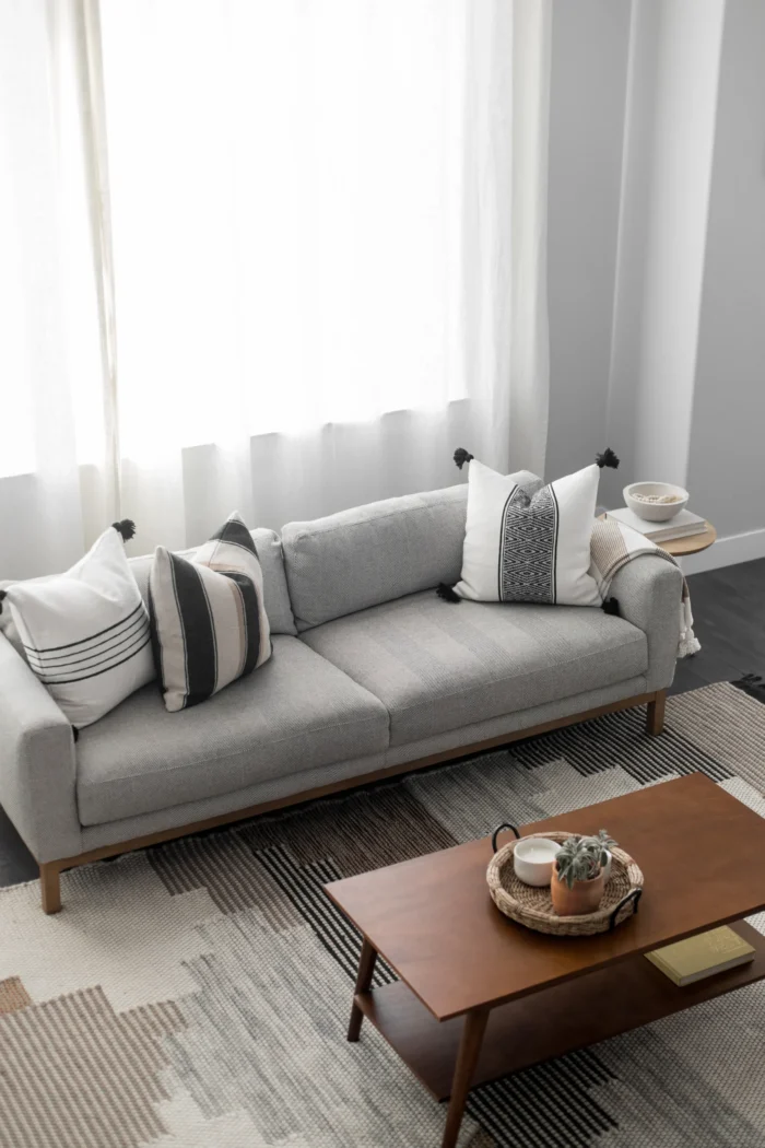 Moroccan handwoven pillow in cream, tan, and black stripes – neutral earthy tones for modern boho decor