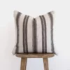 Front view of handwoven Moroccan pillow in white with horizontal warm grey stripes – minimalist and artisan cotton cushion for neutral interiors