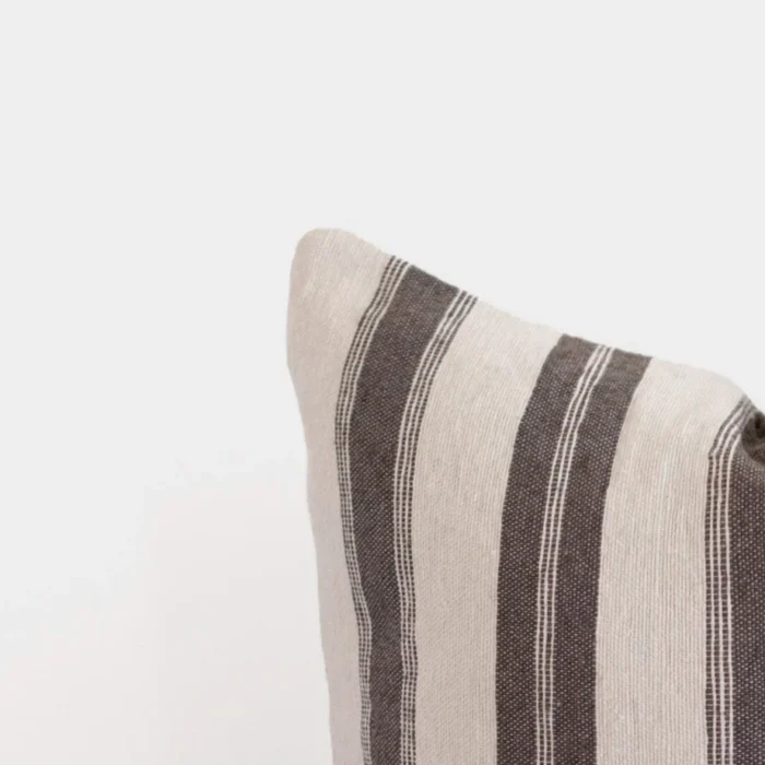 warm grey stripes on a clean white Moroccan pillow – handmade cotton detailing for a soft, artisanal cushion look