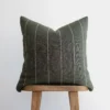 Front view of moss green Moroccan pillow with horizontal off-white stripes – handcrafted cotton cushion for earthy and boho interior decor
