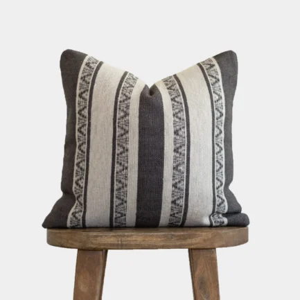 handwoven warm charcoal Moroccan pillow with cream horizontal stripes and artisan embroidery – decorative cotton cushion in 18", 20", and 24" sizes