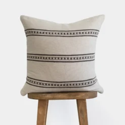 Artisan handmade Moroccan pillow cover made from 100% cotton, featuring a minimalist white base with horizontal brown stripes – modern and timeless cushion cover for sofas, beds, and chairs