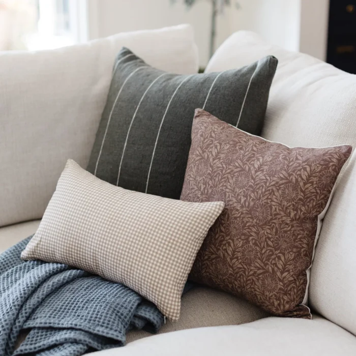 artisan Moroccan pillow in moss green with off-white stripe pattern – handmade cotton accent cushion for natural interiors