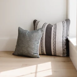 warm charcoal pillow with hand-stitched cream stripes and embroidered detailing – artisan Moroccan cushion in multiple sizes