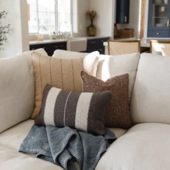 Spice mince woven stripe pattern on tan Moroccan pillow – handmade cotton texture for elegant home deco