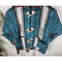 turquoise and black patterned Moroccan hoodie highlighting traditional pattern, hood, and wool blend fabric, unisex artisan outerwear.