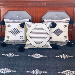 Three black Moroccan cotton pillows hand-embroidered in white – included in luxury handmade blanket set