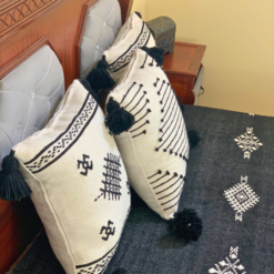 Handmade Moroccan pillows in white with detailed Black embroidery – included in handmade wool blanket set