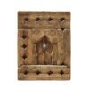 Handcrafted vintage Moroccan wall panel featuring tribal Berber carvings and rustic aged wood