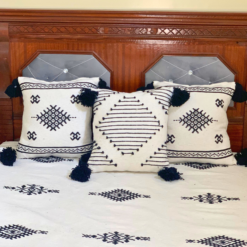Set of 3 hand-embroidered Moroccan pillowcases in white with elegant black stitching – part of handmade blanket set