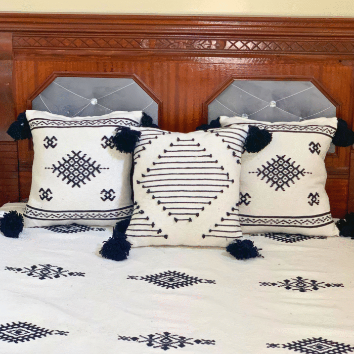 Set of 3 hand-embroidered Moroccan pillowcases in white with elegant black stitching – part of handmade blanket set