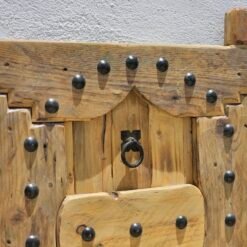 handcrafted Moroccan shutter highlighting rivet design
