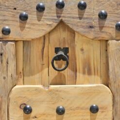 top panel and door knocker of Moroccan cedar shutter