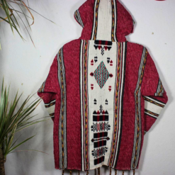 Flat lay of handcrafted pink and white Moroccan fleece hoodie – premium unisex boho jacket – cozy festival and travel outerwear