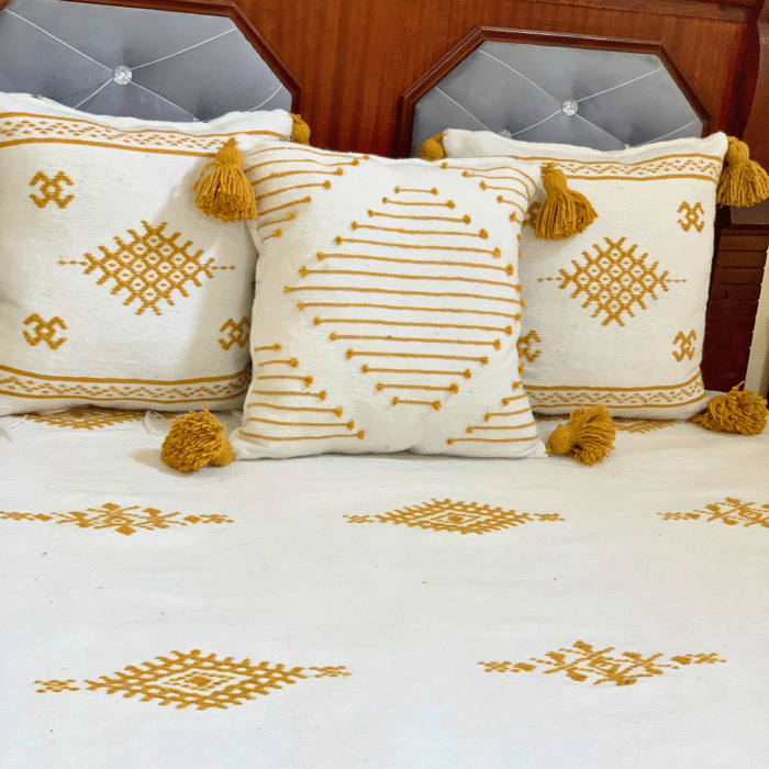 Moroccan handmade pillowcases in white with mustard yellow embroidery – part of embroidered blanket set