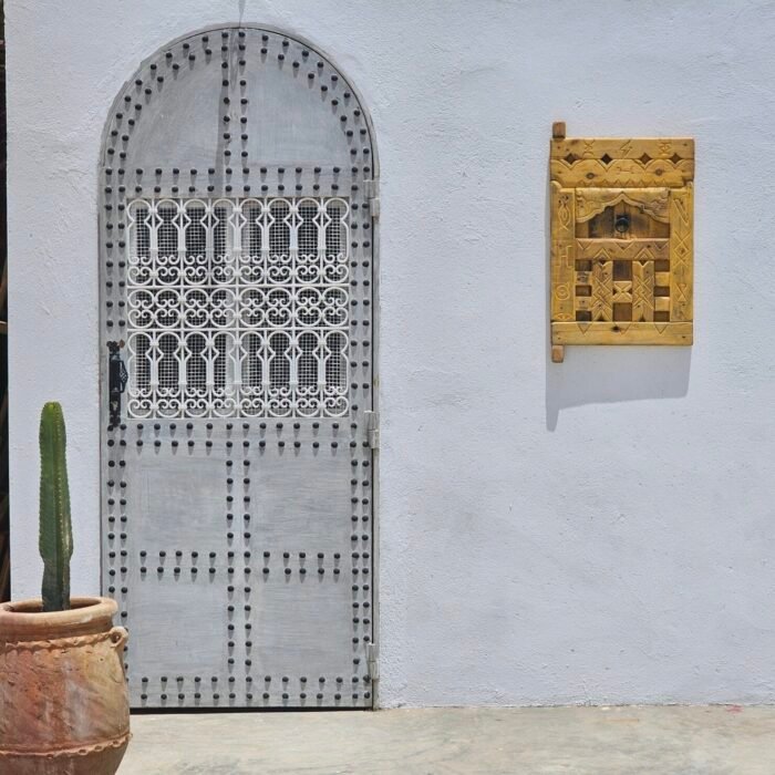 Berber carvings on reclaimed cedar wood panel