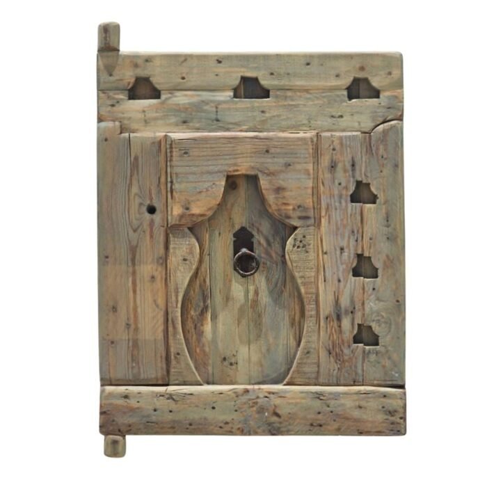 Handcrafted Amazigh cedar wood panel featuring traditional Berber carvings with rustic vintage finish