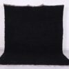 Authentic handmade Moroccan black Beni Ourain rug crafted from 100% natural wool by skilled Berber women artisans. This luxurious black wool rug brings bold elegance, warmth, and cultural charm to modern, bohemian, or minimalist interiors. Perfect for living rooms, bedrooms, or as an eye-catching wall tapestry.