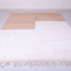 custom Beni Ourain Moroccan rug in warm ivory and tan, blending modern design with authentic Berber craftsmanship.
