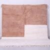 Contemporary handmade Moroccan Beni Ourain rug in ivory and tan, crafted with 100% natural lamb wool and traditional Berber weaving.