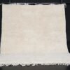 Handmade Moroccan ivory wool rug in Beni Ourain style, crafted from 100% natural lamb wool with a soft creamy tone – perfect for modern, minimalist, and boho interiors