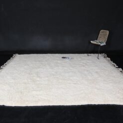 solid ivory Moroccan rug with thick, plush wool texture – minimalist Berber rug made to order