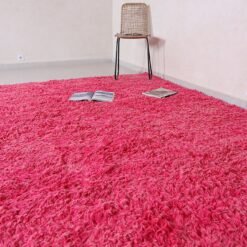 Moroccan Beni Ourain rose pink rug with plush surface.