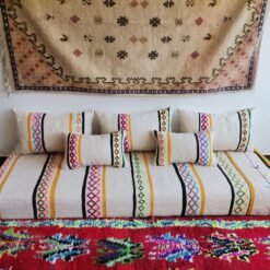 Bohemian living room with ivory Moroccan floor sofa set featuring multicolor embroidery