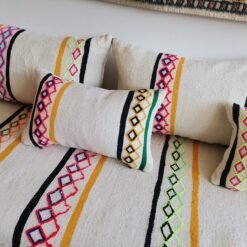 Unstuffed Moroccan floor cushions with zippered covers laid flat