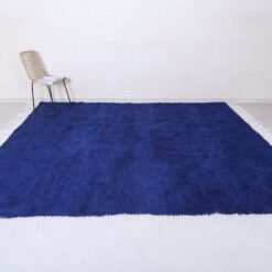 Moroccan royal blue Beni Ourain rug showing plush wool texture and deep blue vibrant color, perfect for modern and classic interiors."