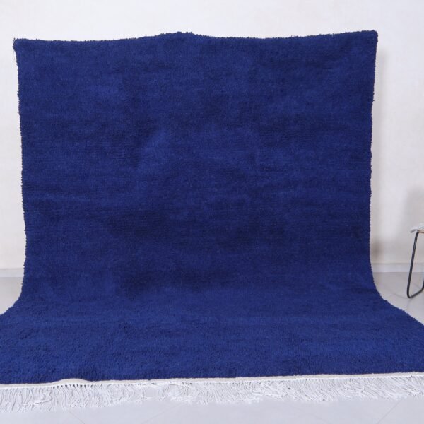 Handmade Moroccan royal blue Beni Ourain rug crafted from 100% natural lamb wool, showcasing traditional Berber weaving and vibrant deep blue color, perfect for living room or bedroom decor.