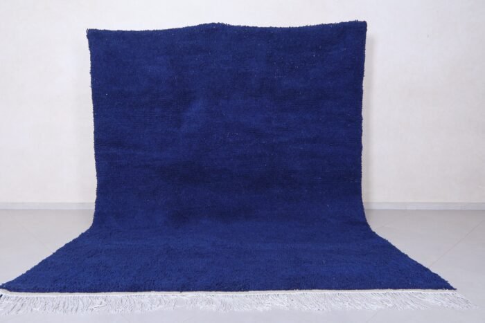 Moroccan royal blue Beni Ourain rug highlighting soft, thick wool pile and detailed hand-knotted Berber patterns in deep blue tone.