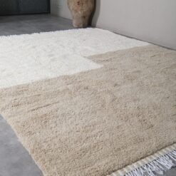 ivory and taupe Moroccan wool rug, showcasing clean contemporary design and thick handcrafted wool pile.