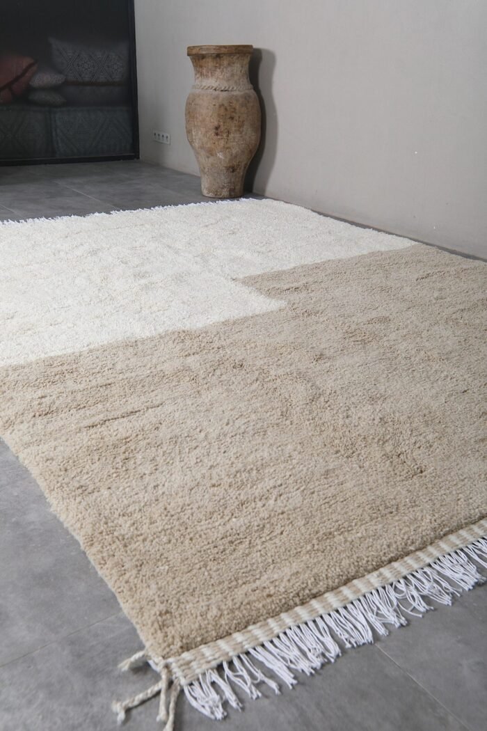 ivory and taupe Moroccan wool rug, showcasing clean contemporary design and thick handcrafted wool pile.