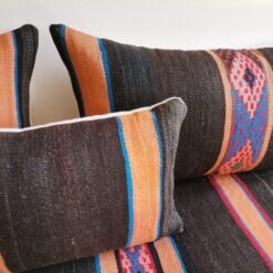 Interior detail showing quality stitching and hidden zipper on wool cushion