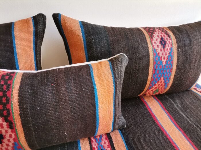 Interior detail showing quality stitching and hidden zipper on wool cushion