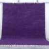 Handmade Moroccan royal purple wool rug with traditional Beni Ourain design.