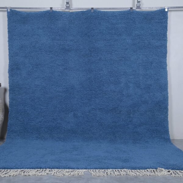 Moroccan Beni Ourain rug, featuring clean lines and traditional craftsmanship. Adds warmth to any living room or bedroom.