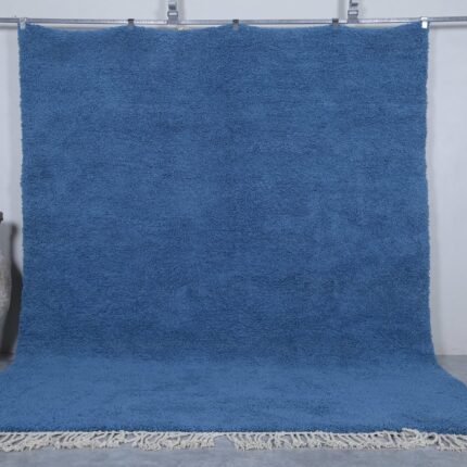Moroccan Beni Ourain rug, featuring clean lines and traditional craftsmanship. Adds warmth to any living room or bedroom.