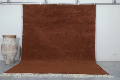 Handmade Moroccan dark brown wool rug with traditional Beni Ourain design and rich texture.
