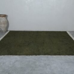 handmade Dark Green Moroccan Rug in its full 10.3 x 11.5 ft dimension, revealing even weave, solid tone, and soft pile perfect for boho or rustic interiors.
