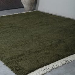 Moroccan Dark Green Rug showing the handwoven wool fibers, thick Beni Ourain texture, and high-quality Moroccan craftsmanship from local Berber women.
