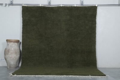Handmade Moroccan Dark Green Berber Rug crafted from 100% natural wool, featuring a deep green solid color and traditional Beni Ourain weave—perfect for living rooms, bedrooms, or minimalist interiors