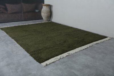 Dark Green Beni Ourain Rug, showcasing its rich wool texture, plush feel, and minimalist solid design ideal for contemporary Moroccan decor.